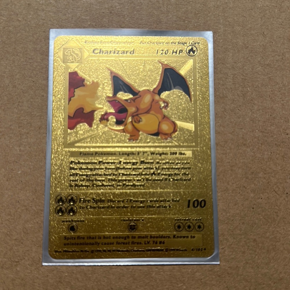 COPY - Golden first edition Charizard. EXCELLENT CONDITION. OBO